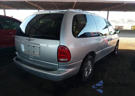 1999 Chrysler Town & Country Limited z USA, uszkodzony, nr VIN 1C4GP64L8XB916537